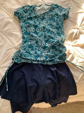 Modli Women’s Teal Floral Swim Top and Navy Skirted Swim Bottoms